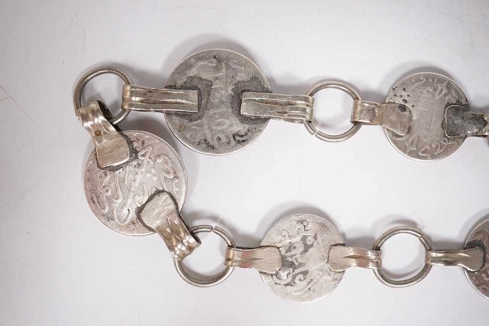 An early 1960's Georg Jensen sterling brooch, no. 339 (designed by Henning Koppel, 58mm, together with a small group of jewellery and other items including a pair of silver oval cufflinks, a Persian coin necklace, a 14ct